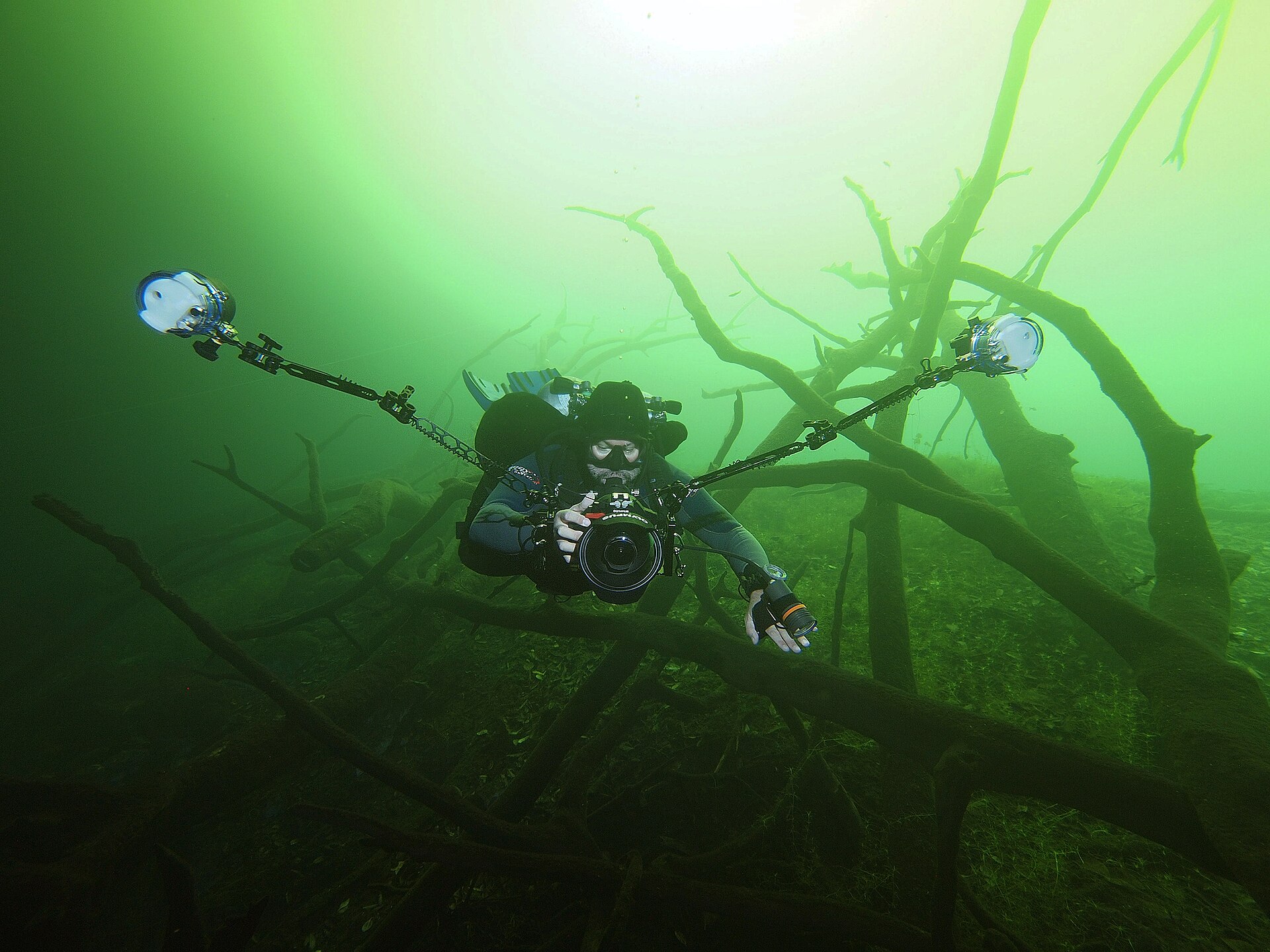Diver inside a Yucatan cenote, Mexico