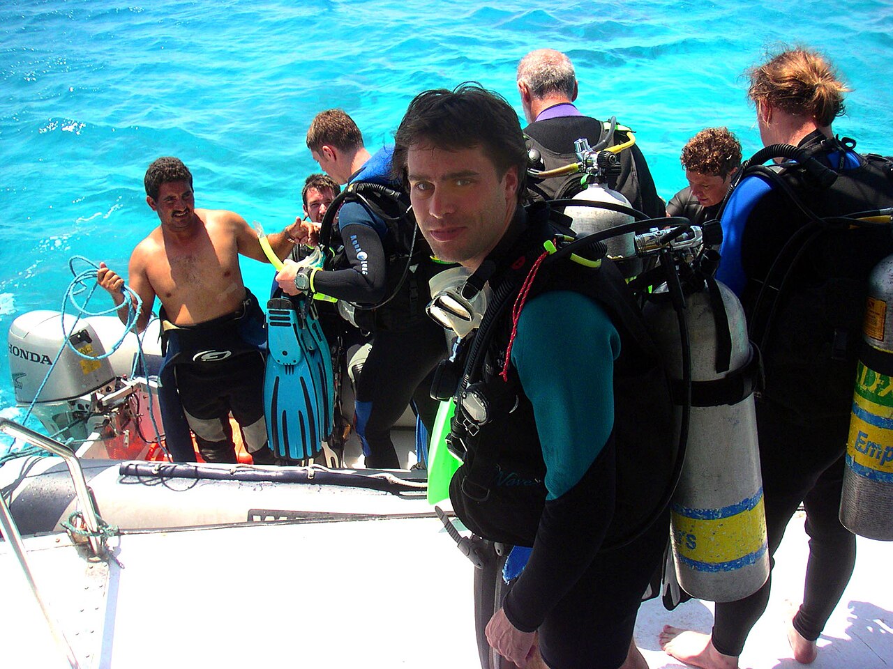 Divers boarding a RIB from a dive boat on the Red Sea, Egypt
